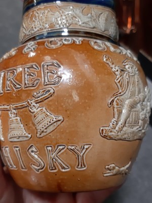 Lot 132 - A collection of Doulton stoneware harvest jugs and similar, Markham & Roberts ale flagon etc