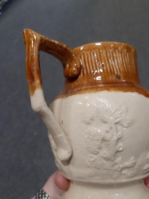 Lot 132 - A collection of Doulton stoneware harvest jugs and similar, Markham & Roberts ale flagon etc