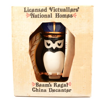 Lot 115A - Beam's Regal Owl decanter, and a Beswick Benagles decanter, both with contents
