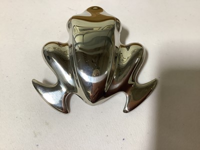 Lot 443 - Henning Koppel for Georg Jensen - a frog paperweight.
