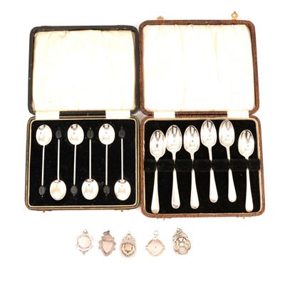 Lot 265 - Set of silver coffee spoons, Isaac Ellis & Sons, Sheffield 1903, another set, and five silver fobs.