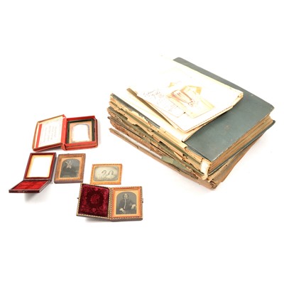 Lot 270 - Two albums of postcards and a small number of loose photographic portraits and daguerreotypes