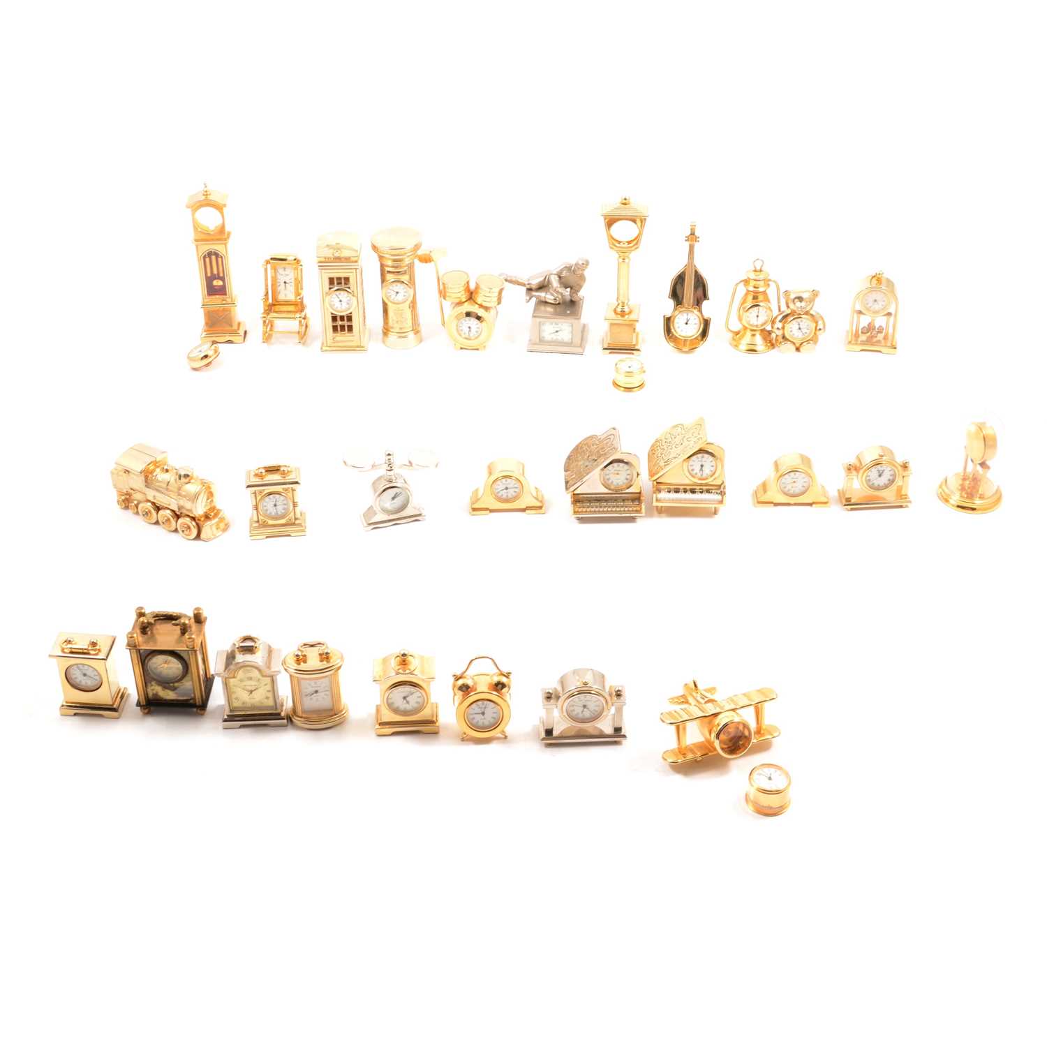 Lot 203 - Thirty miniature novelty carriage clocks.