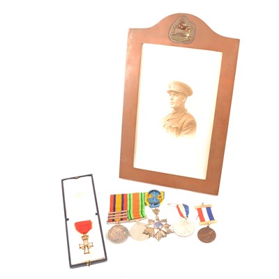 Lot 232 - A collection of medals, badges and awards relating to three main recipients.