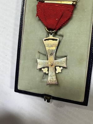 Lot 232 - A collection of medals, badges and awards relating to three main recipients.