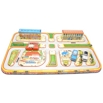 Lot 235 - Technofix City Traffic Drive and Park tinplate set, including three clockwork vehicles and key