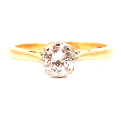 Lot 73 - A diamond solitaire ring.