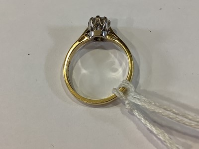 Lot 73 - A diamond solitaire ring.