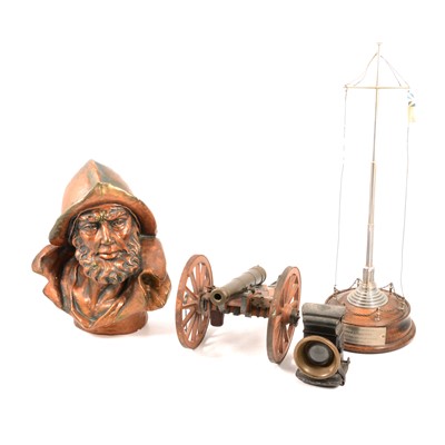 Lot 147 - Presentation ships mast; composite bust of a sailor, scale model of a canon, and a cycle lamp.