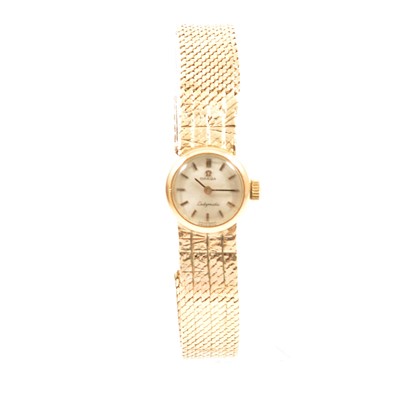 Lot 206 - Omega - a lady's 9 carat yellow gold bracelet watch.