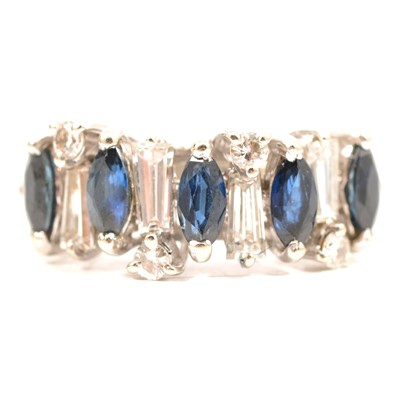Lot 22A - A sapphire and diamond half hoop ring.