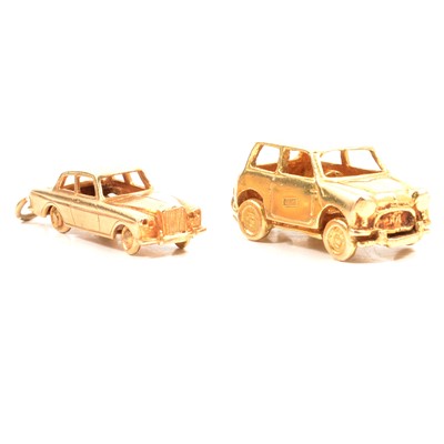 Lot 138A - Two 9 carat gold charms of motoring interest.