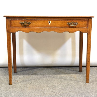 Lot 437 - Late Georgian oak lowboy