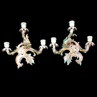 Lot 68A - Pair of Continental porcelain three-light wall candelabra
