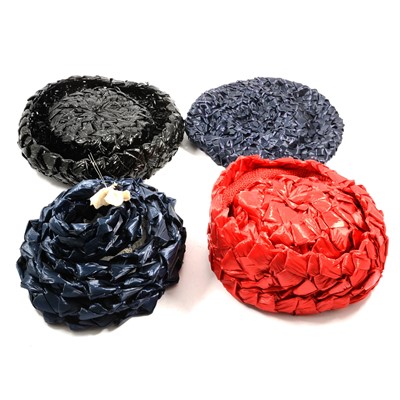 Lot 326 - Simone Mirman and Jeanne Pierre- four coloured raffia style hats.