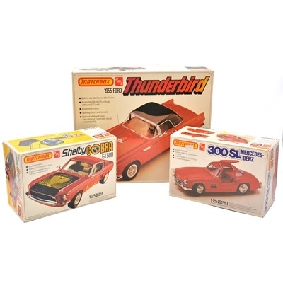 Lot 199 - Three Matchbox AMT plastic model car kits, boxed.