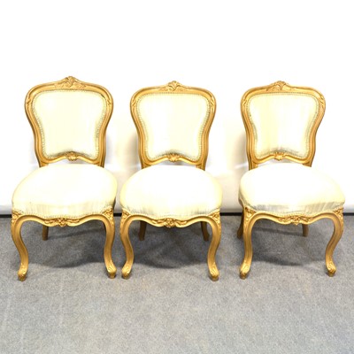 Lot 395 - Three French gold painted salon chairs