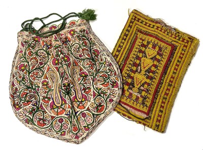 Lot 16 - An Indian silk embroidered Indian drawstring bag, and a Kashmir Baluch bag
