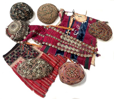 Lot 27 - Collection of Turkmen hats and clothing