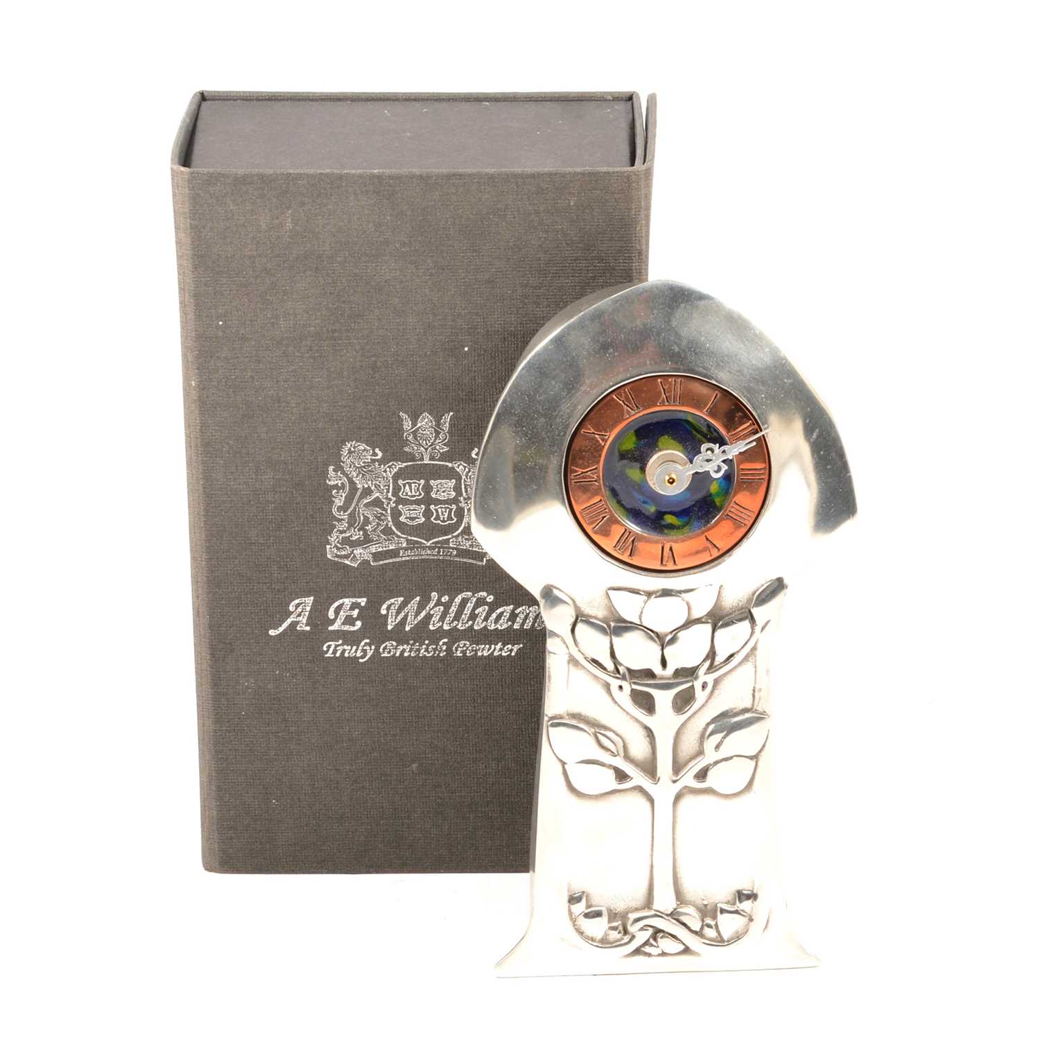 Lot 506 - An Arts and Crafts style pewter and enamel clock by A E Williams, Birmingham