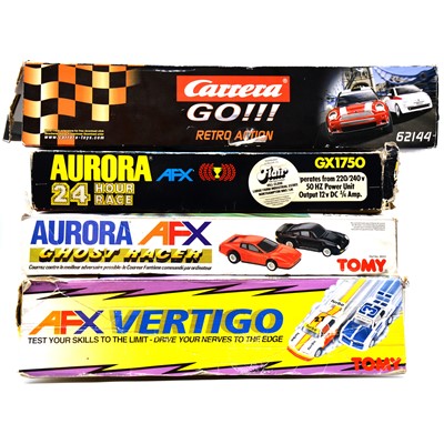 Lot 261 - Four slot car racing sets, including Aurora AFX, Carrera