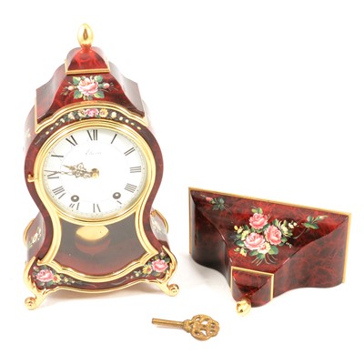 Lot 166 - Modern red lacquered bracket clock, with bracket