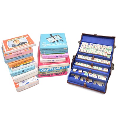 Lot 129a - Sixteen vintage party games and a Mahjong set in leather case.