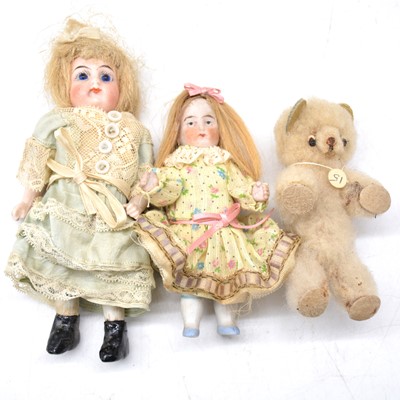 Lot 217 - Two miniature early 20th century bisque dolls and a teddy bear.