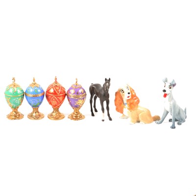 Lot 64 - Collection of twelve musical eggs by House of Faberge, Wade Disney figures, etc