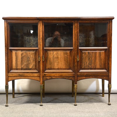 Lot 321 - Edwardian breakfront rosewood display cabinet, three doors, on gilt metal legs.