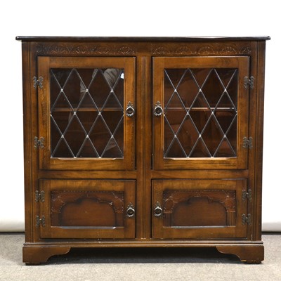 Lot 380 - Modern oak glazed bookcase, small oak coffer and a wine table