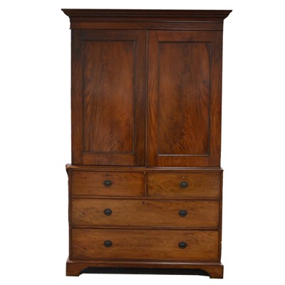 Lot 387 - George III mahogany linen press