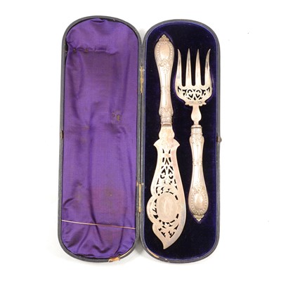 Lot 223 - Pair of Victorian silver fish servers, cased.