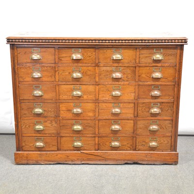 Lot 465 - Edwardian oak chest of twenty four filing drawers