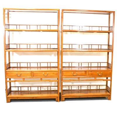 Lot 424 - Pair of Chinese style hardwood open bookcases