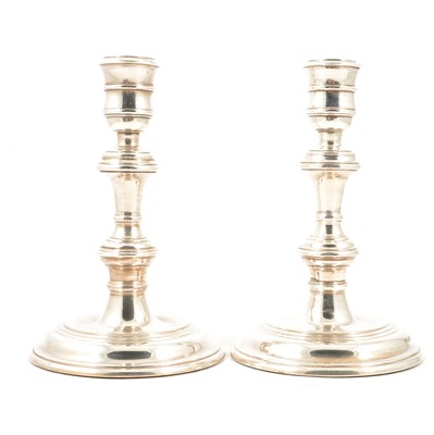 Lot 235 - Pair of George I style silver candlesticks