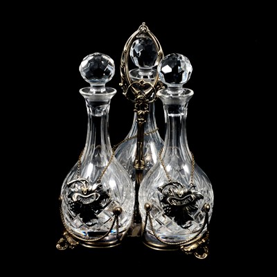 Lot 169 - Electroplated three-bottle tantalus