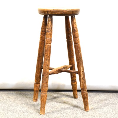 Lot 457 - Victorian country-made oak tripod table and a stool