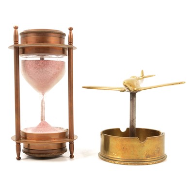 Lot 94 - Kelvin & Hughes, Brass hourglass timer/ compass, 1917, and a brass airplane desk ornament