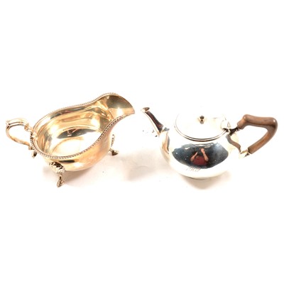 Lot 274 - American silver teapot and a sauceboat