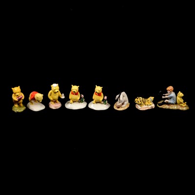 Lot 114 - Eight Royal Doulton Winnie the Pooh figures, boxed