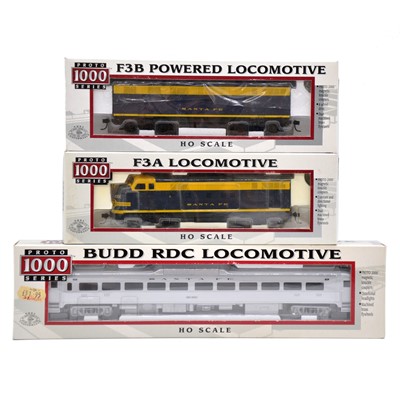 Lot 80 - Three Proto 1000 HO gauge diesel locomotives and powered cars, boxed