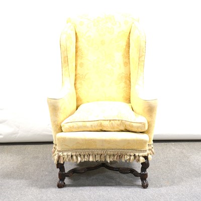 Lot 423 - George III style wing back armchair