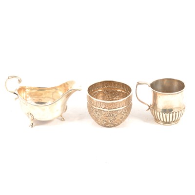 Lot 270 - Silver sauce boat; mug and sugar bowl.