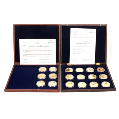 Lot 194 - Eight wooden coin cases containing gold plated and printed commemorative coins