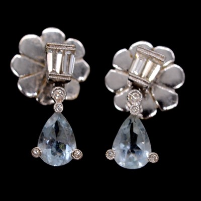 Lot 151 - A pair of aqua coloured and diamond earrings.