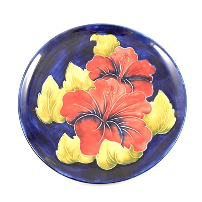 Lot 19 - Moorcroft Pottery, a 'Hibiscus' design plate