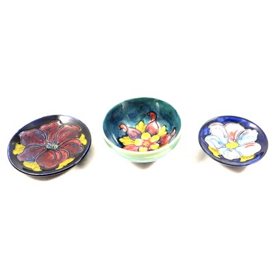 Lot 532 - Moorcroft Pottery, a small 'Columbine' design bowl and two pin dishes