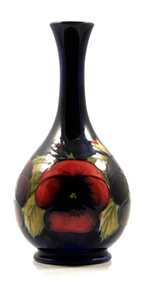 Lot 520 - Moorcroft Pottery, a 'Pansy' design vase
