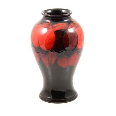 Lot 21 - William Moorcroft, a flambe 'Wisteria' design vase